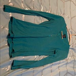 Long sleeve shirt.   Can unbutton